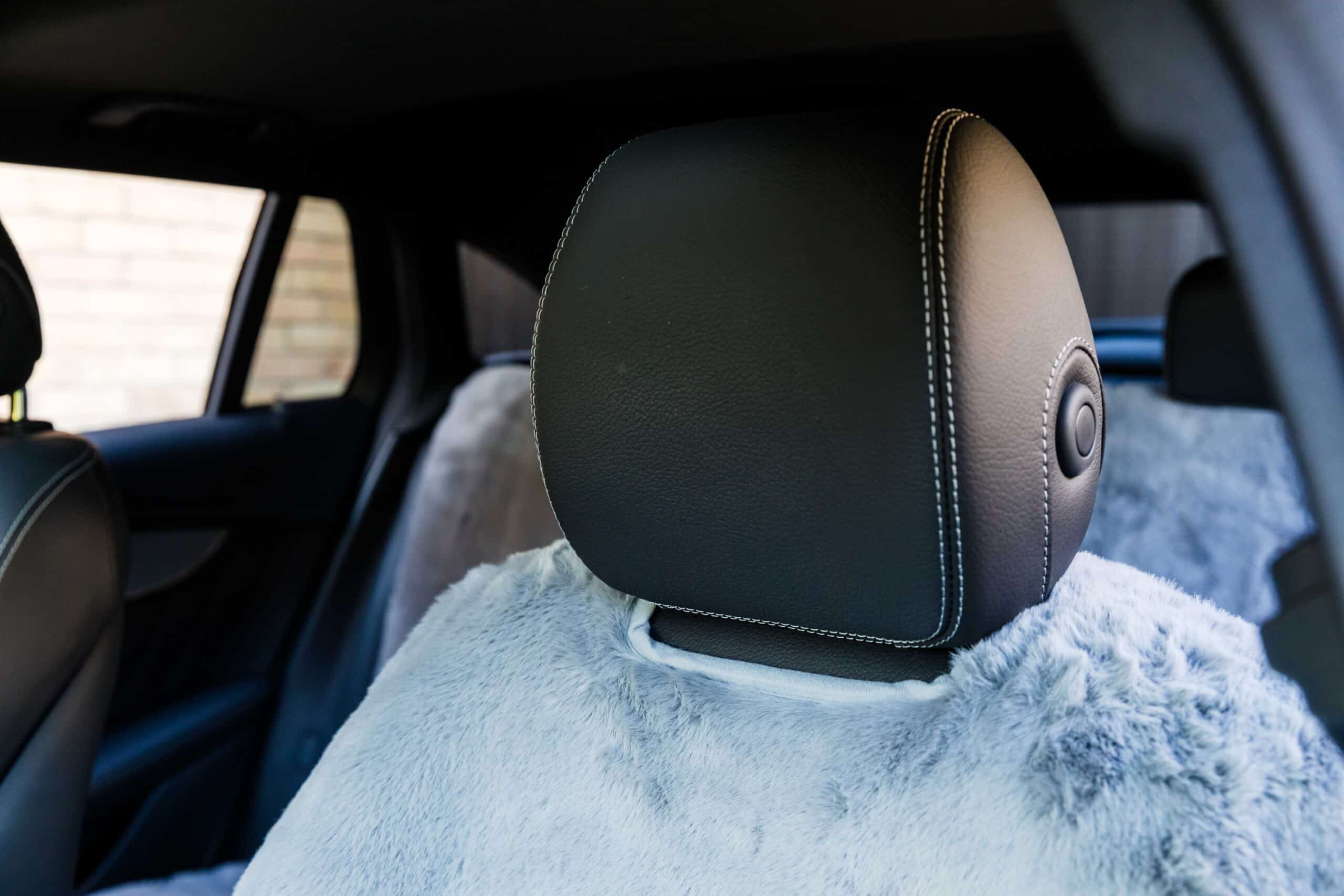 Machine washable dog car seat cover being easily cleaned in a washing machine